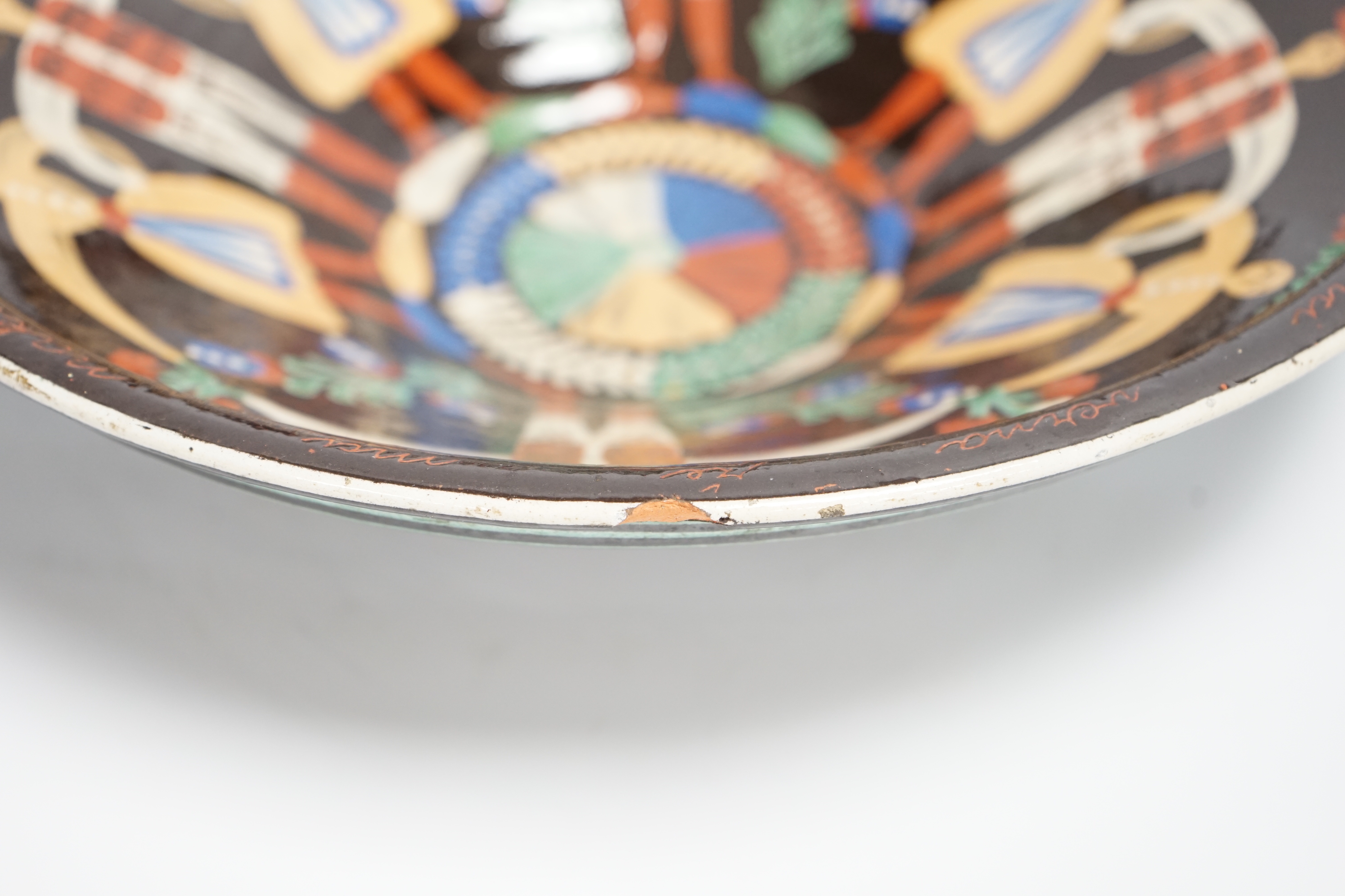 A large Continental slipware dish, probably Hungarian, 35cm